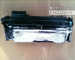 Handout image shows a toner cartridge discovered aboard a cargo plane in East Midlands, north of London, Friday.