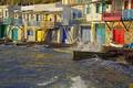 Wild sea and the fisher houses at Klima  (Photo: Tom Pfeiffer)