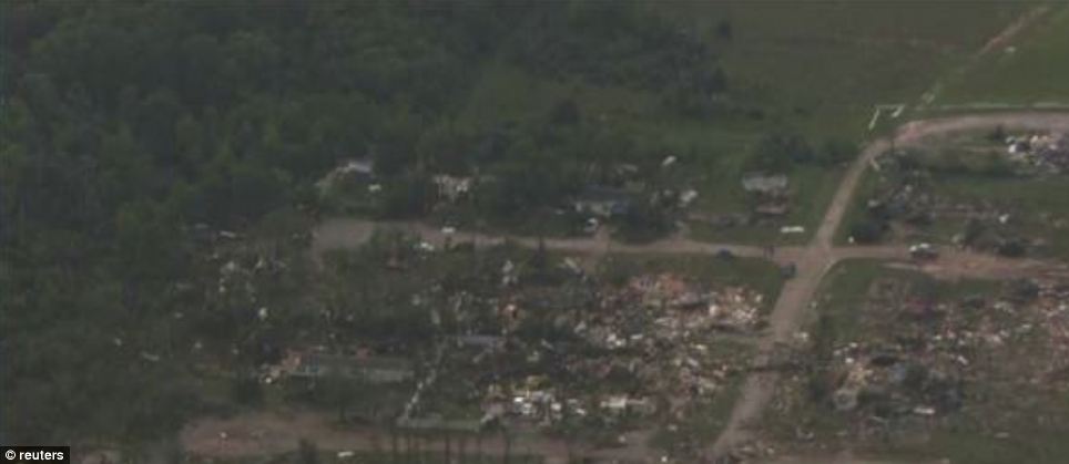 Wiped out: A residential area near Shawnee is pictured after a tornado tore through the area, destroying several homes