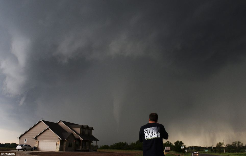 On record: Storm chaser videographer and photographer Brad Mack records a tornado 
