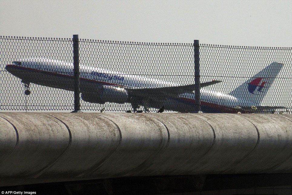 Doomed: Flight MH17 takes off from Schiphol Airport in Amsterdam hours before it was shot down over Ukraine