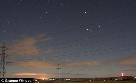 A spectacular shot of the meteor taken by amateur astronomer Graeme Whipps in northern Scotland