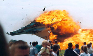 Spectators watch as a SU-27 fighter plane crashes while performing manoeuvres at an airshow near the western Ukrainian city of Lviv on Saturday.